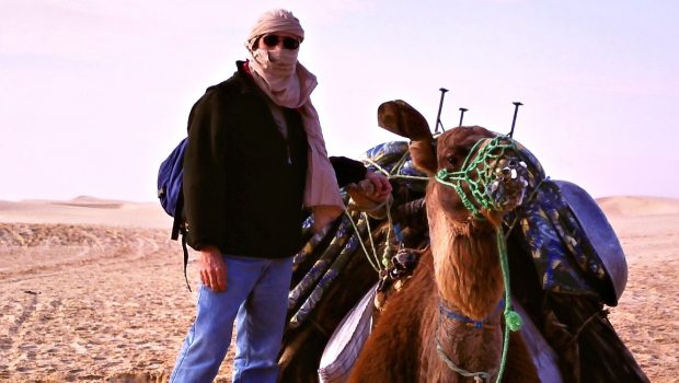 Steve and Hogar at the start of the camel trek in Douz, Tunisia-SAI-focus_1875x750